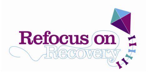 Photo of the refocus on recovery - the words with a blue and purple kite to the right