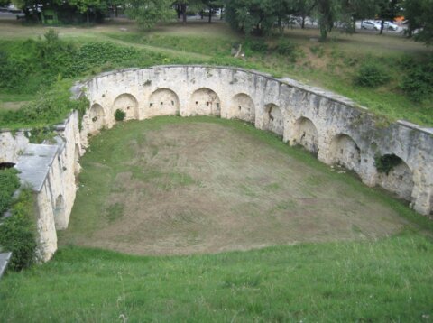 Photo of a historic wall surrounding a grassy area, taken by Kelvin Felix as part of the project