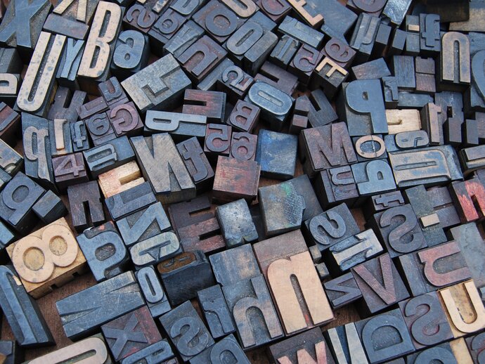 Photo of old printing press letters and numbers