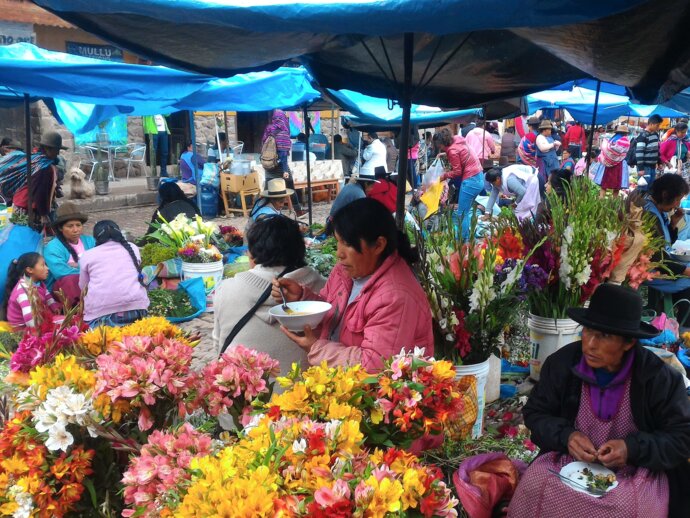 Photo of people at a flower market