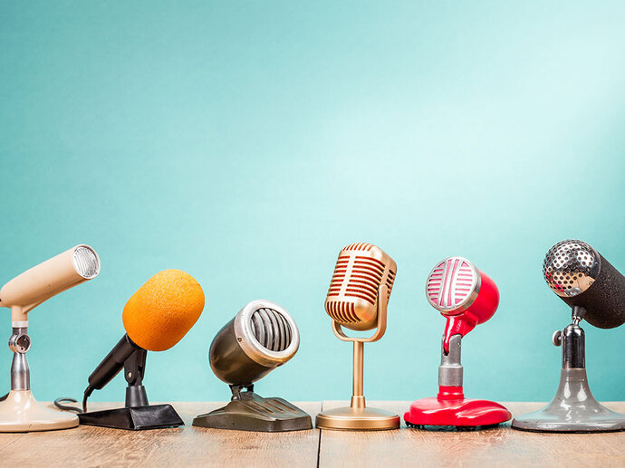 Picture of several microphones lined up together