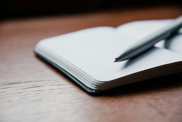 diary notebook with a pen