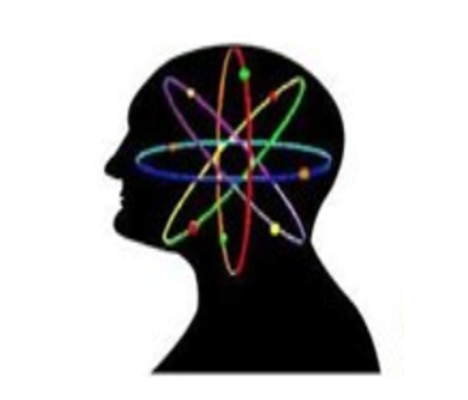 Picture of a silhouette of a head with a colourful atoms design inside