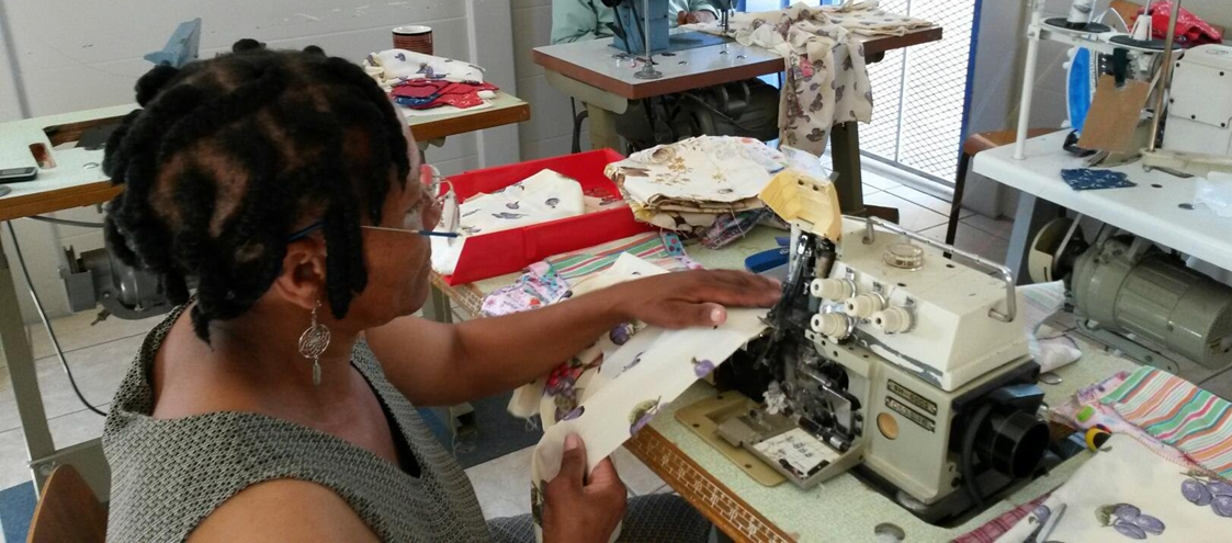 A woman in a busy office