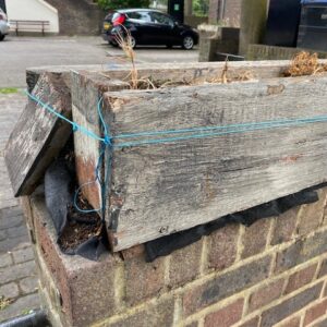 a wooden plant box held together with string
