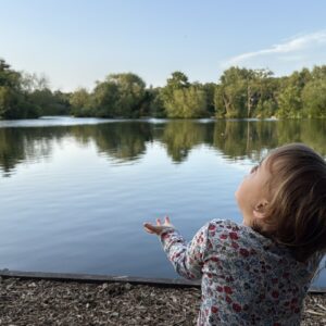 small child by a lake