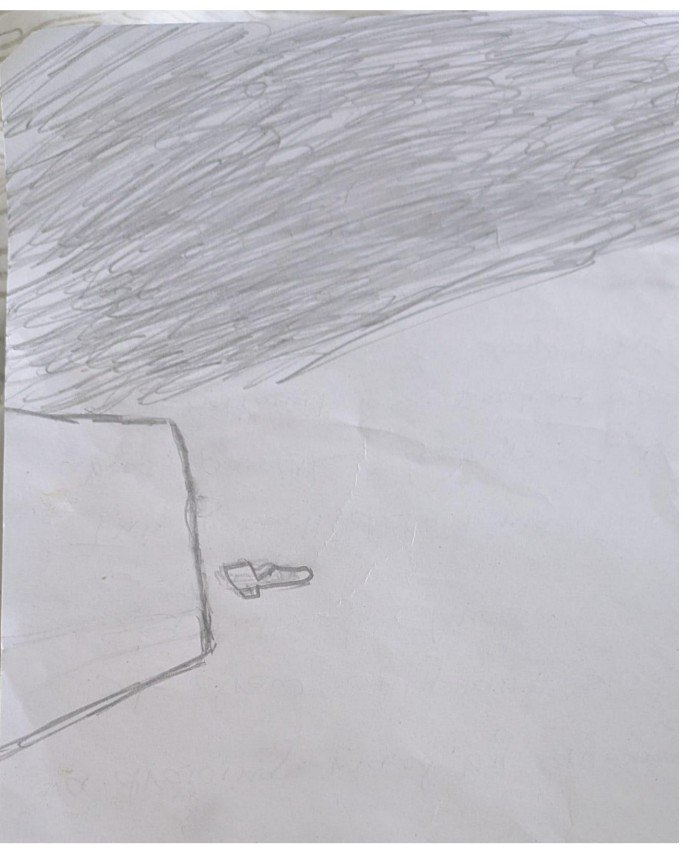 Child's drawing of a shoe under a cloudy sky